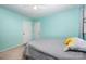 Bright bedroom with ample natural light and neutral-toned furnishings at 2109 Quail Nw Dr, Concord, NC 28027