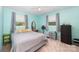 Bright bedroom with ample natural light and neutral-toned furnishings at 2109 Quail Nw Dr, Concord, NC 28027