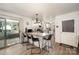 Bright kitchen boasts a breakfast bar with seating and access to a sunroom at 2109 Quail Nw Dr, Concord, NC 28027