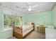 Bright bedroom featuring a twin bed, desk and sunny window at 220 Holmes Ct, Concord, NC 28027
