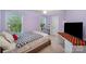 Comfortable bedroom with desk and large windows providing plenty of natural light at 220 Holmes Ct, Concord, NC 28027