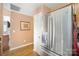 Stainless steel refrigerator in a kitchen with wood floors and neutral walls at 220 Holmes Ct, Concord, NC 28027