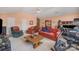Spacious living room with vaulted ceiling, exercise equipment and ample seating at 220 Holmes Ct, Concord, NC 28027