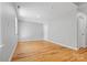 Bedroom with hardwood floors, neutral paint, and plenty of natural light at 220 Plonk Rd, Dallas, NC 28034