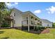 Well-maintained home featuring a spacious covered porch with hanging plants and manicured landscaping at 220 Plonk Rd, Dallas, NC 28034