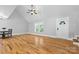Bright living room with hardwood floors, neutral paint, and ample natural light at 220 Plonk Rd, Dallas, NC 28034