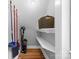 Storage space with shelving and storage containers, including cleaning supplies at 220 Plonk Rd, Dallas, NC 28034