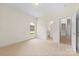 Bedroom with carpet, window, and adjoining bathroom offers comfort and privacy at 2241 Flagstick Dr, Matthews, NC 28104