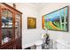 Elegant bathroom featuring unique art, a stylish cabinet, and modern fixtures at 229 N Church St # 401, Charlotte, NC 28202