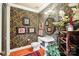 Quaint powder room featuring unique floral wallpaper and a pedestal sink at 229 N Church St # 401, Charlotte, NC 28202