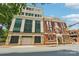 A sophisticated exterior showcasing the building's architectural design and urban setting at 229 N Church St # 401, Charlotte, NC 28202