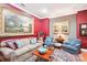 Cozy living room with paintings, comfortable seating, and a decorative rug at 229 N Church St # 401, Charlotte, NC 28202