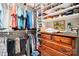 Organized walk-in closet with clothing racks, shoe shelves, and a dresser with multiple drawers at 229 N Church St # 401, Charlotte, NC 28202