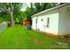 Exterior of home featuring expansive yard, showcasing the property's outdoor space and potential at 238 Deaton St, Statesville, NC 28677