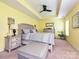 Inviting bedroom with tray ceilings, neutral decor, and ample natural light at 3009 Canopy Dr, Indian Trail, NC 28079