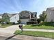 Charming two-story home with manicured front yard and an attached garage at 3009 Canopy Dr, Indian Trail, NC 28079