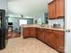 Spacious kitchen with granite countertops and a view into the living room at 3009 Canopy Dr, Indian Trail, NC 28079
