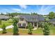 Beautiful home with landscaped yard, brick facade, dormer windows, and a gray shingle roof at 3256 Fairmead Dr, Concord, NC 28025