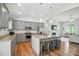 Spacious kitchen boasts granite counters, stainless appliances, large island, and open layout at 3256 Fairmead Dr, Concord, NC 28025