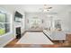 Spacious living room boasts a fireplace, modern decor, and bright windows for natural light at 3256 Fairmead Dr, Concord, NC 28025