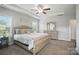 Serene main bedroom with tray ceilings, neutral tones, carpet, and natural light at 3256 Fairmead Dr, Concord, NC 28025