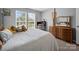 Bright bedroom featuring lots of light, neutral walls, and plenty of space at 3301 Old Knobbley Oak Dr, Gastonia, NC 28056