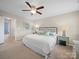 Calm bedroom featuring a ceiling fan and matching side tables at 3301 Old Knobbley Oak Dr, Gastonia, NC 28056