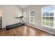 A home gym featuring wood floors and lots of light at 3301 Old Knobbley Oak Dr, Gastonia, NC 28056
