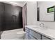 Bathroom featuring a black tile shower, and grey vanity with granite countertop at 3308 Carmel Rd, Charlotte, NC 28226