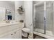 Bathroom with white vanity, toilet, and tiled walk-in shower at 3332 Katherine Taylor Ct, Monroe, NC 28110