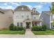 Charming two-story home with landscaped yard and covered front porch at 3332 Katherine Taylor Ct, Monroe, NC 28110
