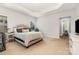Serene main bedroom with tray ceiling and neutral color palette at 3332 Katherine Taylor Ct, Monroe, NC 28110