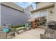The backyard patio features seating for outdoor dining and entertaining at 3332 Katherine Taylor Ct, Monroe, NC 28110