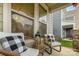 Inviting porch with comfortable seating and stylish decor, perfect for relaxing outdoors at 3332 Katherine Taylor Ct, Monroe, NC 28110