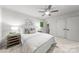 Peaceful bedroom with ceiling fan, and soft carpet at 3519 Campbell Dr, Charlotte, NC 28205