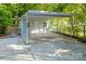 Spacious carport with ample parking and storage, providing protection from the elements at 3519 Campbell Dr, Charlotte, NC 28205