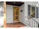 Inviting front door with modern accents and classic brick details at 3519 Campbell Dr, Charlotte, NC 28205