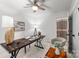 Bright home office featuring a large desk, modern decor, and a ceiling fan for added comfort at 3519 Campbell Dr, Charlotte, NC 28205