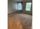 Bedroom with plush carpeting and large window with natural light at 3717 English Garden Dr, Gastonia, NC 28056