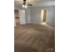 Spacious bedroom with neutral paint, ceiling fan, and two entryways at 3717 English Garden Dr, Gastonia, NC 28056