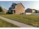 Charming two-story home with a well-manicured lawn at 3717 English Garden Dr, Gastonia, NC 28056