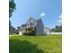 Well-maintained two-story home with a landscaped front yard at 3717 English Garden Dr, Gastonia, NC 28056