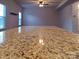 Close up view of granite countertop and spacious kitchen island at 3717 English Garden Dr, Gastonia, NC 28056