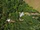 Explore this secluded property featuring mature trees and a peaceful setting, perfect for a private retreat at 3881 Wood Duck Ln, Denver, NC 28037