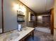 Double sink vanity and shower with sliding doors offer convenience and functionality at 3881 Wood Duck Ln, Denver, NC 28037