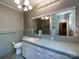 Bathroom with a tiled vanity and large mirror provides space and character at 3881 Wood Duck Ln, Denver, NC 28037