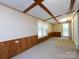 Bedroom with carpet floors, wood trim, and natural light offers comfort and character at 3881 Wood Duck Ln, Denver, NC 28037