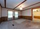 Bedroom with carpet, paneled walls and ample lighting at 3881 Wood Duck Ln, Denver, NC 28037