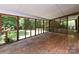 Large porch with view of yard and surrounding trees at 3881 Wood Duck Ln, Denver, NC 28037