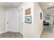 Bright hallway featuring wood floors and access to the living space at 4227 Mackinnon Dr, Charlotte, NC 28214